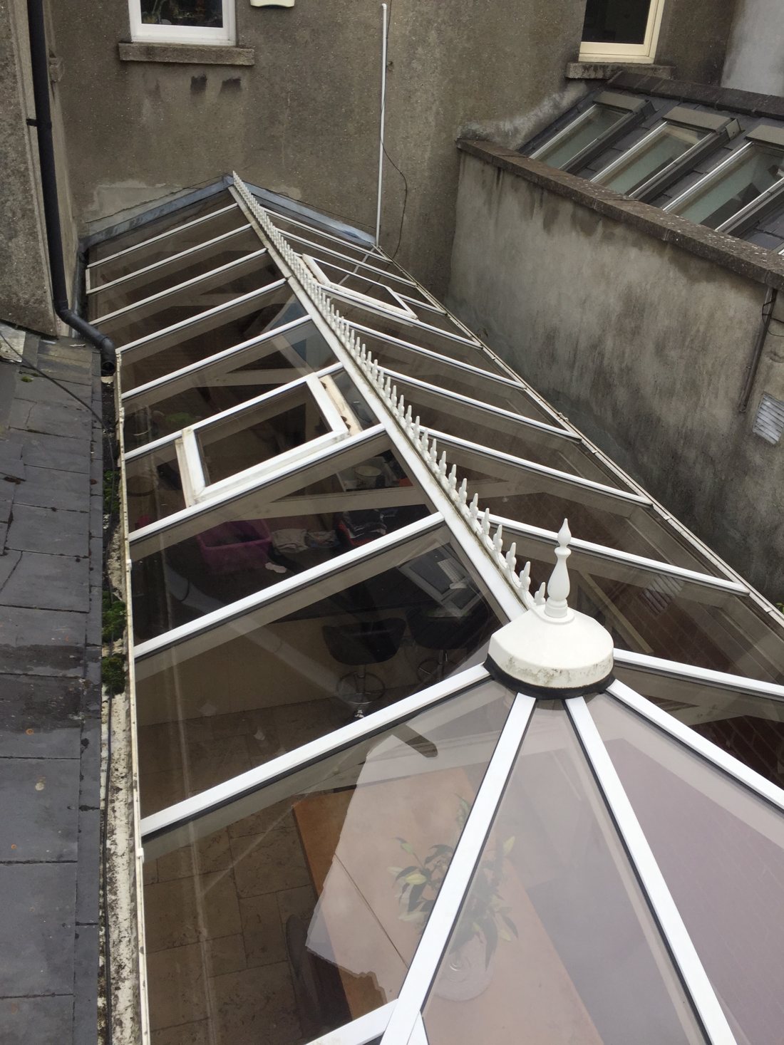 Freshly cleaned conservatory roof on a red-brick Dublin house