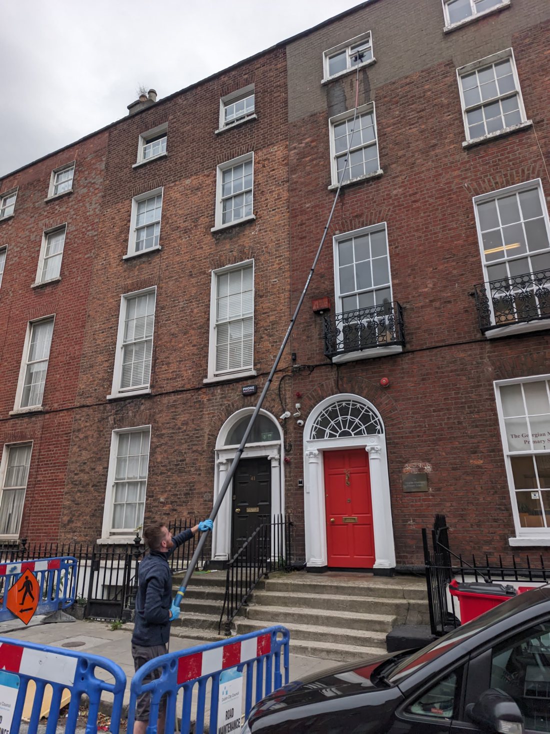 High reach window cleaning on a Dublin apartment building